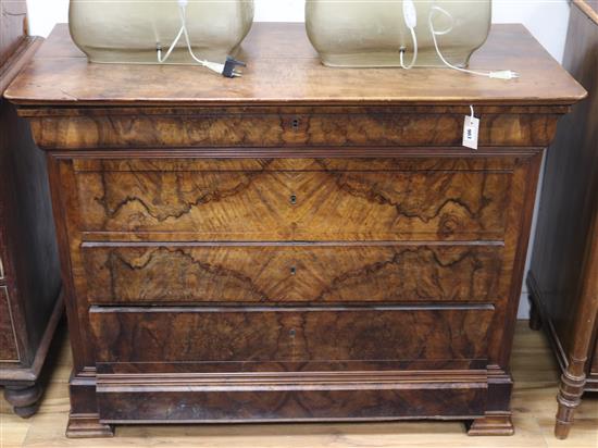 A French figured walnut commode W.124cm